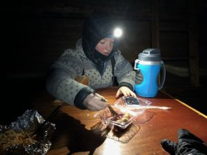 Kiana Eating Hilltop Pie In The White Mountains